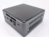 a small computer that is sitting on top of a table