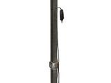 a metal pole with a light on top of it
