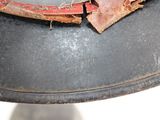 a close up of a helmet that has a piece of cloth on it
