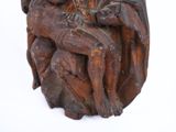 a statue of a man and a woman sitting on a rock