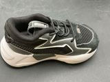 a close up of a pair of shoes on a table