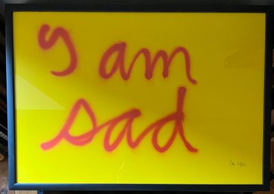 a picture of a sign that says i am dad
