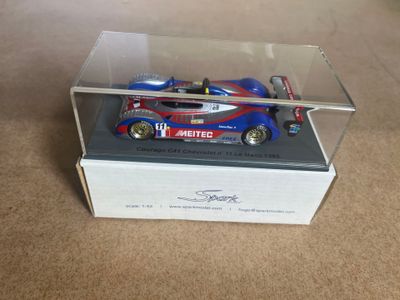 a model of a race car in a display case