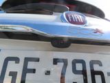a close up of a license plate on the back of a car