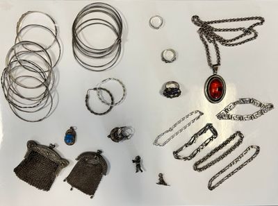 many different types of jewelry displayed on the table