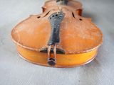 a violin that is sitting on a table