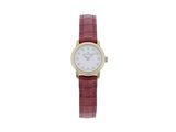 an image of a woman ' s wrist watch with a red strap
