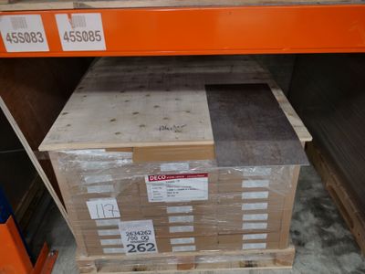 a stack of boxes sitting on a shelf in a store