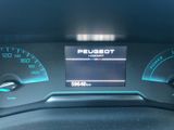 a close up of a dashboard with a speedometer and gauges