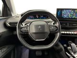 the interior of a car with a steering wheel, dashboard, and display screen