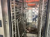 a stainless steel oven that is inside of a kitchen