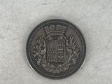 an image of a coin with a coat of arms on it