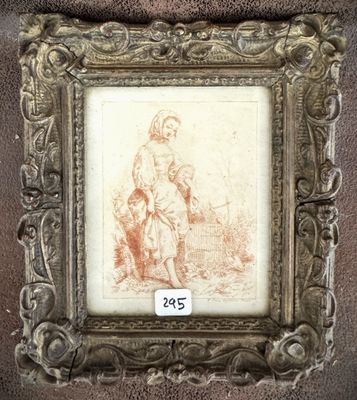 an old picture of a woman holding a child in a frame