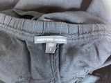 the label is on the back of a jacket that has been worn