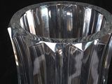 a glass vase that is sitting on a table