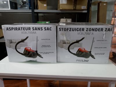 two boxes of aspirateur sanss on a table in a store