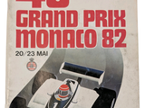un livre sur la couverture duquel figure l'image d'une voiture de course