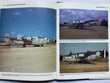 a book with pictures of airplanes on the pages