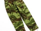 a close up of a pair of camouflage pants on a white surface