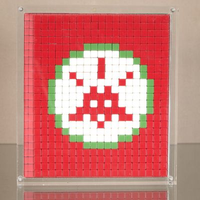 a picture of a red and green tile with white squares