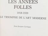 an open book with the title les anne ' s folles, written in french
