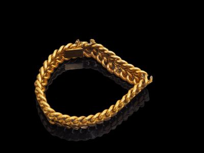 Bracelet en or jaune 18K (750/1000) à mailles fantaisie. Fer… - Photo 1