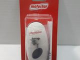 a white remote control in a package on a white table