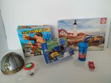 a table with a box of toys and a box of magnets