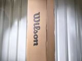 a box that is sitting on a table in front of a wall