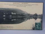 a picture of a postcard with a picture of a river in the background