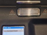 an image of a gold nugget in a machine
