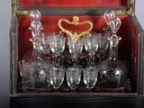 a box with a bunch of wine glasses inside of it