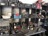 a workbench with many tools on it in a garage