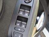 a close up of a car ' s dashboard with buttons