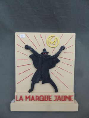 sculpture représentant un homme tenant un frisbee dans ses mains