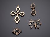 four different types of jewelry on a black surface