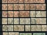 a group of stamps with different colors and designs on them