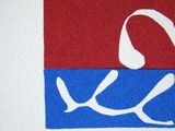 a picture of a red and blue square with a bird on it