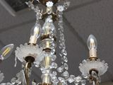 a chandelier hanging from the ceiling in a room