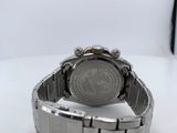 a close up of a wrist watch on a white surface