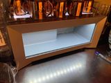 a display case with a lot of mugs on it