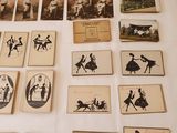 a lot of pictures on the table with a lot of them