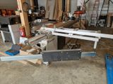 a picture of a machine that is working on a piece of wood