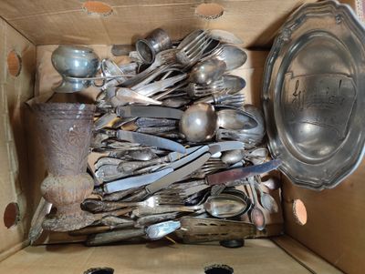 a box full of old silverware in it