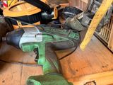 some tools are sitting on top of a table in a garage