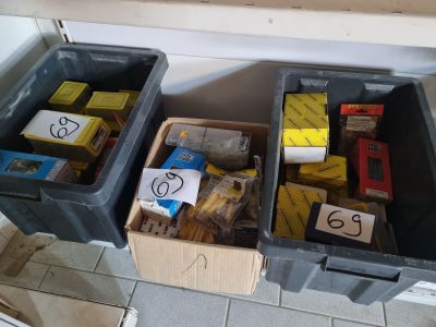 two bins that are filled with assorted items