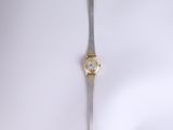 an image of a gold and silver wrist watch on a white background