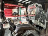 an image of a forklift driver ' s seat in the back of a truck