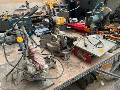 many tools that are sitting on a workbench