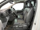 the interior of a white truck with black leather seats and a steering wheel